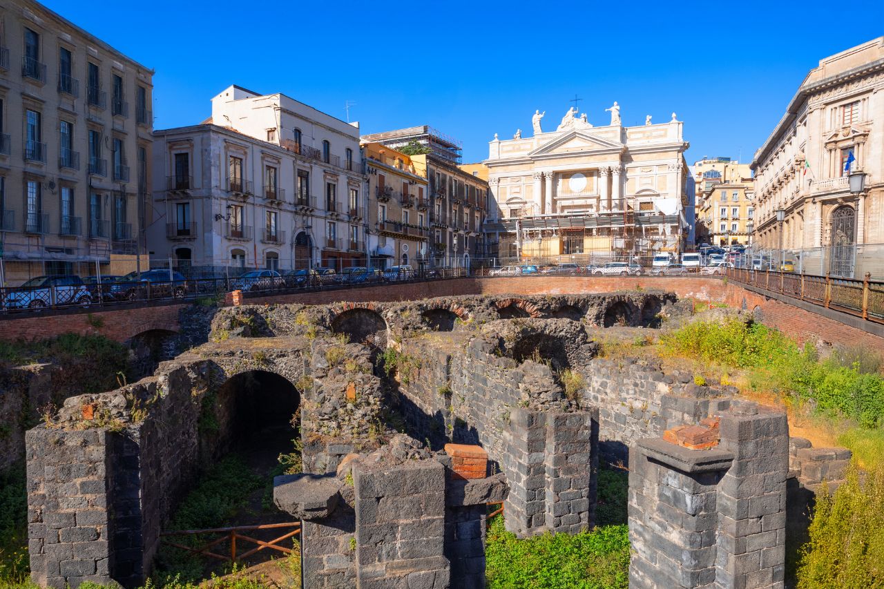 Luxury private vehicle for Catania airport transfer from Taormina Sicily, Scenic coastal route from Taormina to Catania with Mount Etna in background, Professional English-speaking driver for VIP Sicily airport transfer, Catania Fontanarossa Airport terminal with Mount Etna volcanic landscape