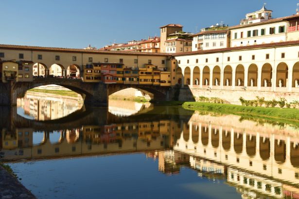 Accademia Gallery Florence close-up Renaissance sculpture, Florence Duomo cathedral dome Brunelleschi architecture cityscape terracotta rooftops, Ponte Vecchio bridge Arno River sunset Florence medieval goldsmith shops