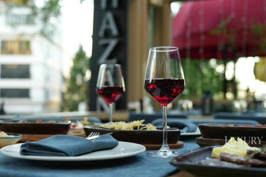 Luxury vineyard landscape in Piedmont Langhe region with rolling hills at sunset, Elegant five-star hotel Principi di Piemonte historic building in Turin Italy, Private boat tour on Lake Como with historic Italian villas in background, Michelin-starred Italian cuisine truffle pasta dishes fine dining Piedmont, Lake Maggiore Borromean Islands Isola Bella palace and terraced gardens, Barolo wine cellar with oak barrels in underground cathedral Piedmont, Milan Duomo Cathedral rooftop terrace with Gothic spires cityscape view, Private truffle hunting experience with trained dog in Alba forest autumn, Luxury resort Casa di Langa contemporary architecture surrounded by vineyards, Leonardo da Vinci Last Supper mural Santa Maria delle Grazie Milan, luxury italy tour piedmont, lake como luxury vacation, piedmont wine tours, milan luxury travel, italian gourmand experience, lake maggiore private tours, truffle hunting Italy, barolo wine tour luxury